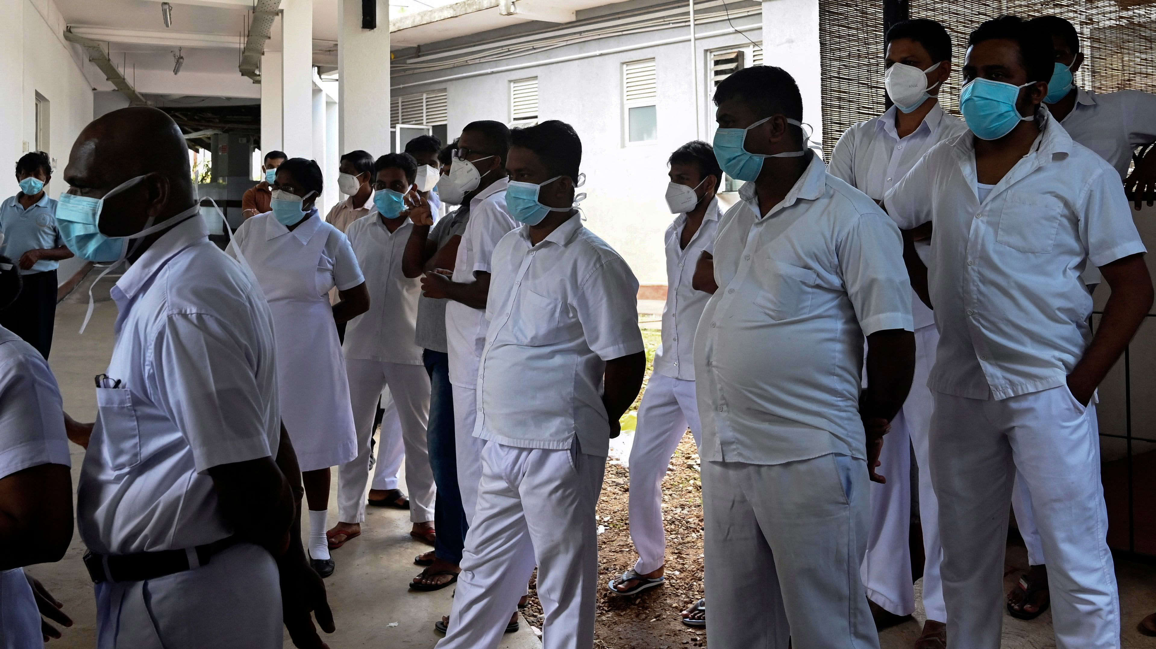 Health workers take part in a strike to demand the same incentives doctors are receiving for their frontline work against the Covid-19, at Colombo South Teaching Hospital in Colombo on June 11, 2021. (AFP image)