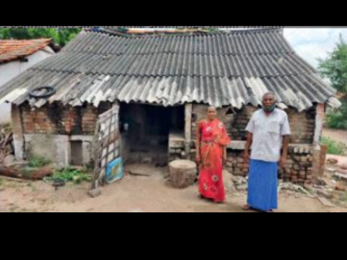 Siddha practitioner Subash Chandrabose with wife Seethalakshmi in front of their house at Kuchapatti village
