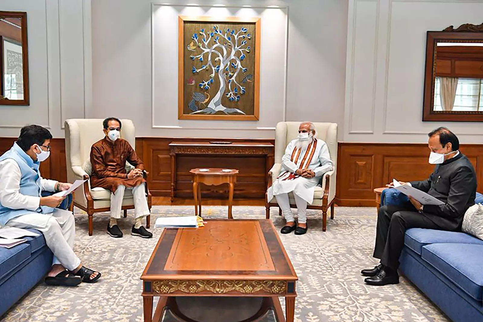  Prime Minister Narendra Modi in a meeting with Maharashtra Chief Minister Uddhav Thackeray, Deputy Chief Minister Ajit Pawar and Cabinet Minister Ashok Chavan (L) in New Delhi. (PTI file Photo)  