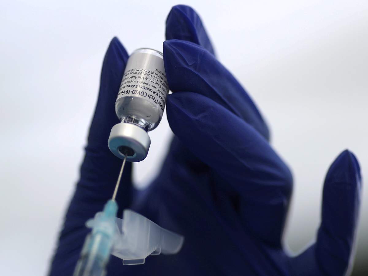 A healthcare worker prepares a Pfizer coronavirus disease (Covid-19) vaccination in Los Angeles. (Reuters)
