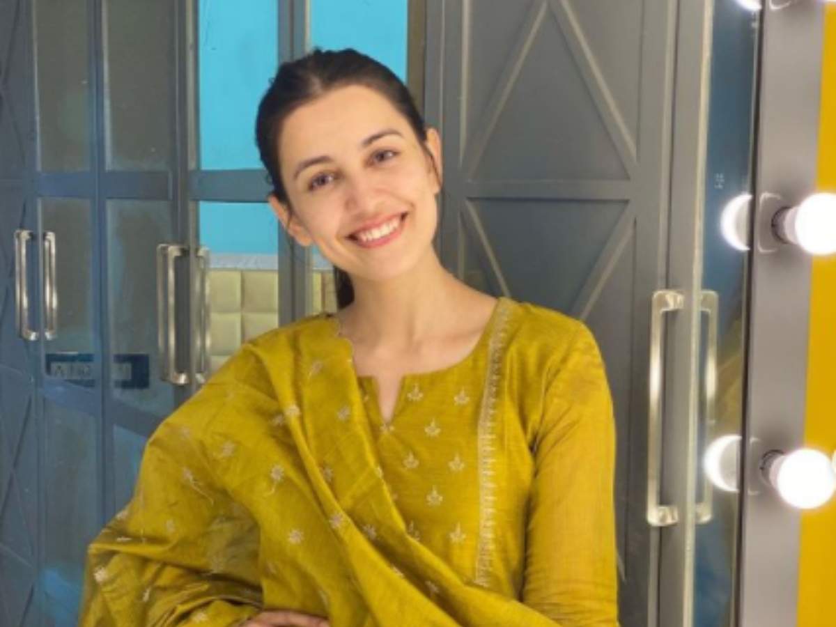 Mable Thomas  Lookbook Mustard Kurti inspired from trendsetter one worn  by actress Trisha in 96 movie Teamed with an Ajrakh modal print dupatta  and royal blue palazzo pants be the head