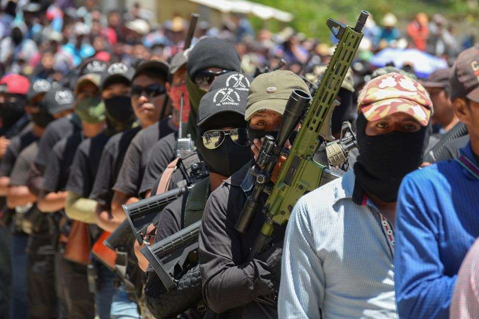 The group resembles the hooded Zapatistas, who sparked world headlines when they emerged from the jungle in 1994, seizing towns and clashing with security forces to demand indigenous rights. (Credits: Reuters)