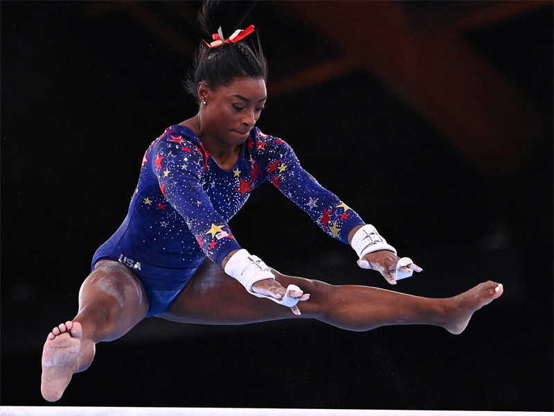 Simone Biles in action on the uneven bars. (Reuters Photo)