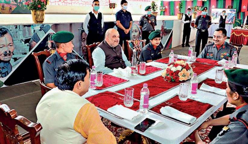 Union home minister Amit Shah during a lunch with Assam Rifles personnel at Laitkor in Shillong on Sunday.