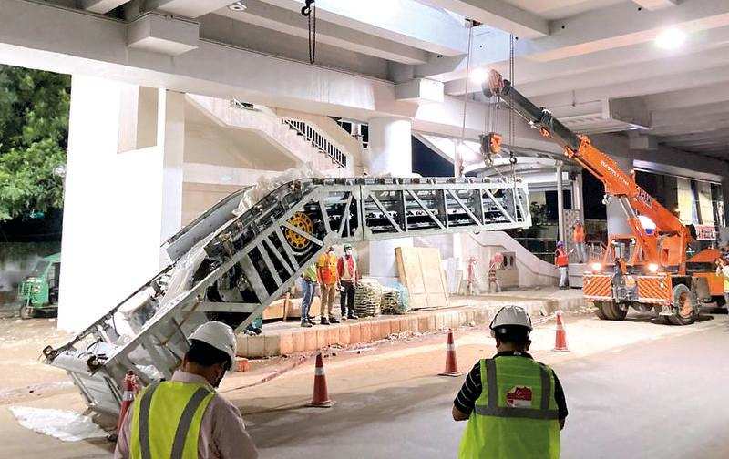 Escalator being installed at a Metro station