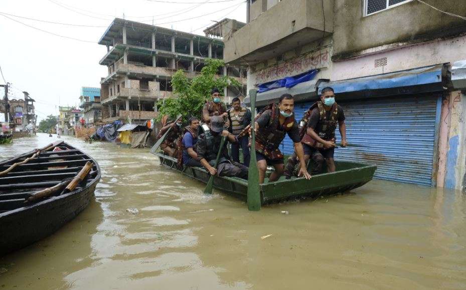 Army team going to evacuate local residents during the rescue operations after the flood hits in the districts of Bengal.