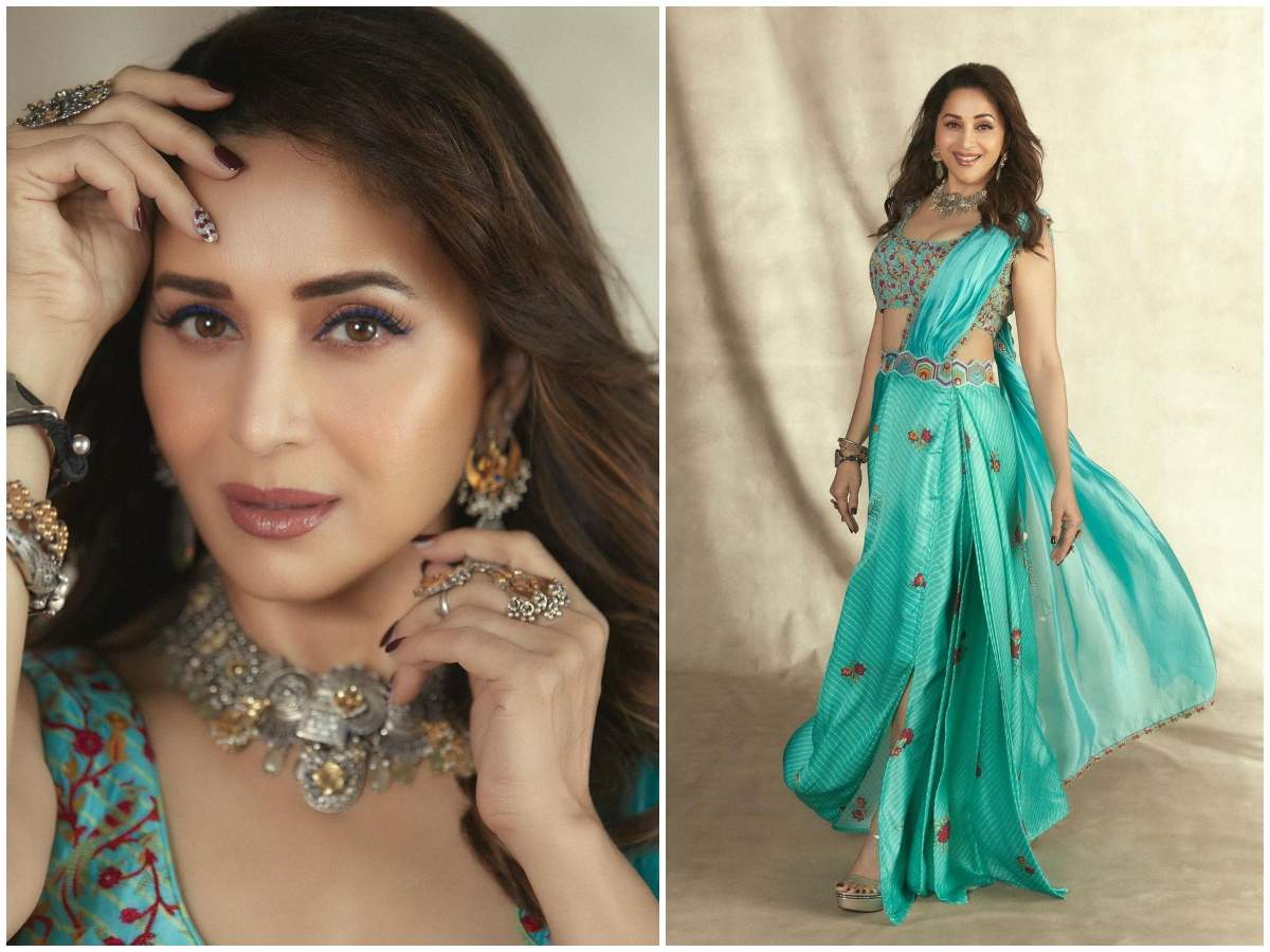 1200px x 900px - Madhuri Dixit stuns in a pre-draped turquoise blue saree; view pics | Hindi  Movie News - Times of India