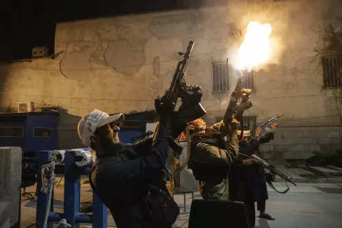 Taliban fighters in Kabul fire their guns in celebration after receiving unconfirmed reports that Panjshir Province had fallen to their forces on Friday, Sept. 3, 2021. (NYT)
