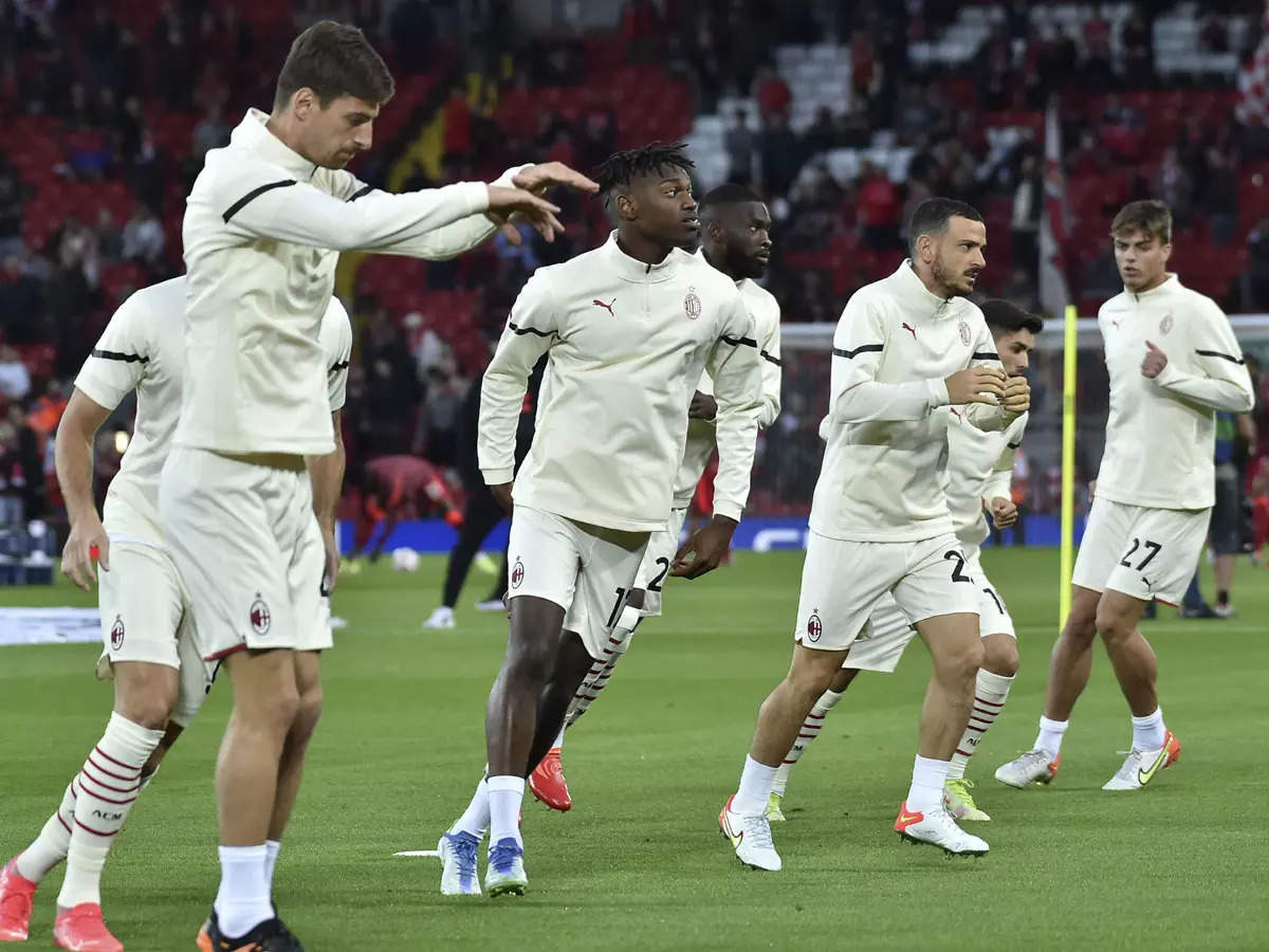 AC Milan players during a warm-up session (AP Photo)
