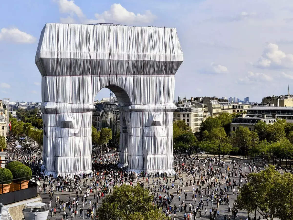 Wrapped in silver: Paris' Arc De Triomphe is now wrapped in 270,000 sq ft of fabric