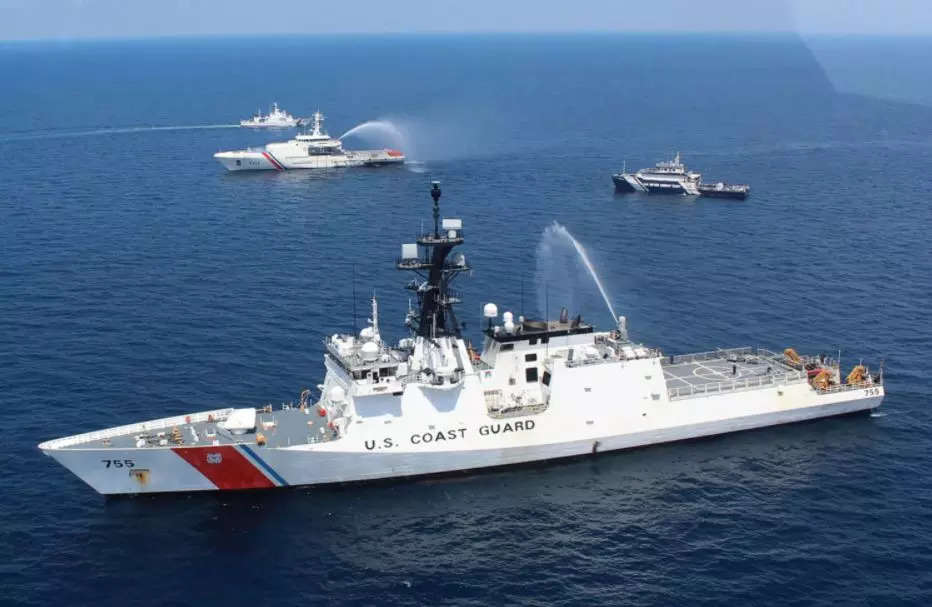 US Coast Guard Cutter Munro (WMSL-755) in the foreground, with Philippine Coast Guard ships including the BRP Gabriela Silang (OPV-8301, at centre L) during a joint maritime exercise in the waters off Subic Bay (AFP file photo)