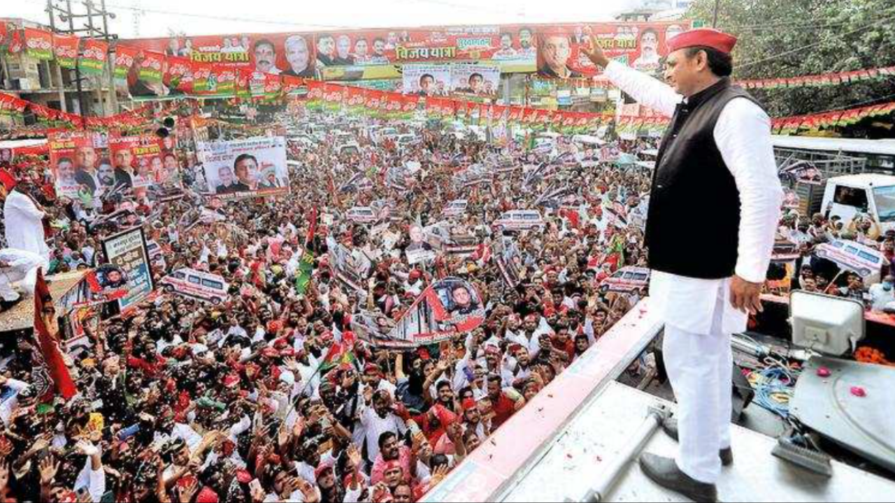 SP chief Akhilesh Yadav waves to supporters on Tuesday