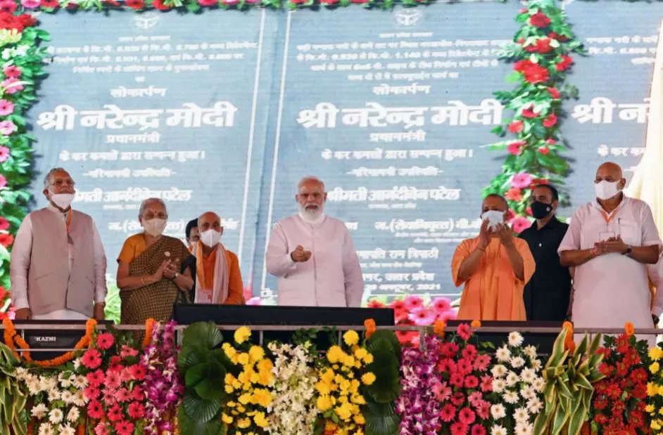 Prime Minister Narendra Modi inaugurates and lays the foundation stone of various development projects, in Kushinagar on Wednesday (ANI)