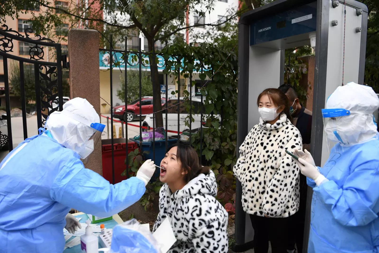 File photo: A medical worker collects a swab from a resident in Lanzhou's Chengguan district.