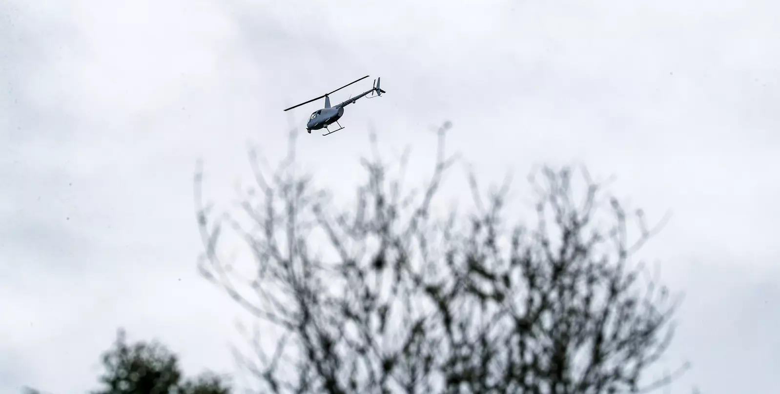 A helicopter aids crews with the FBI and North Port Police and Sheriff's Department as they search for Brian Laundrie at Carlton Reserve Park in Venice, Fla., on September 22, 2021. (File photo: AP)