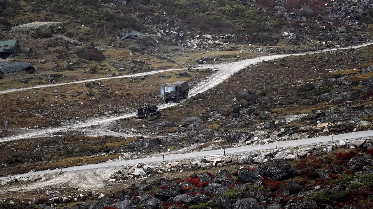 An Indian Army truck drives along a road to Tawang, near the Line of Actual Control (LAC), neighbouring China, near Sela Pass in Arunachal Pradesh (AFP photo)
