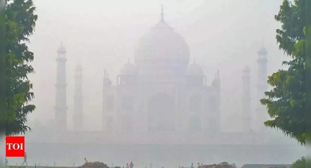 Iconic Taj Mahal disappears behind a blanket of thick smog after Diwali