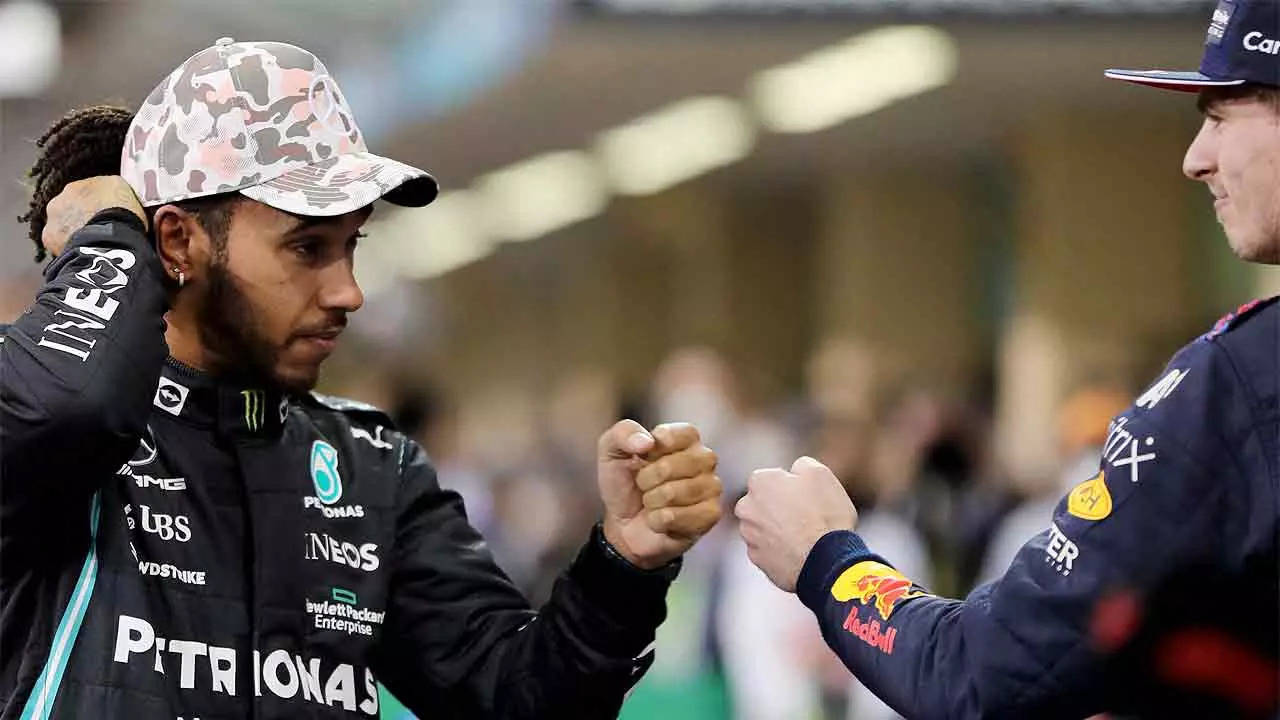 GLOVES OFF: Lewis Hamilton and Max Verstappen after the qualifying race in Abu Dhabi. (AFP Photo)