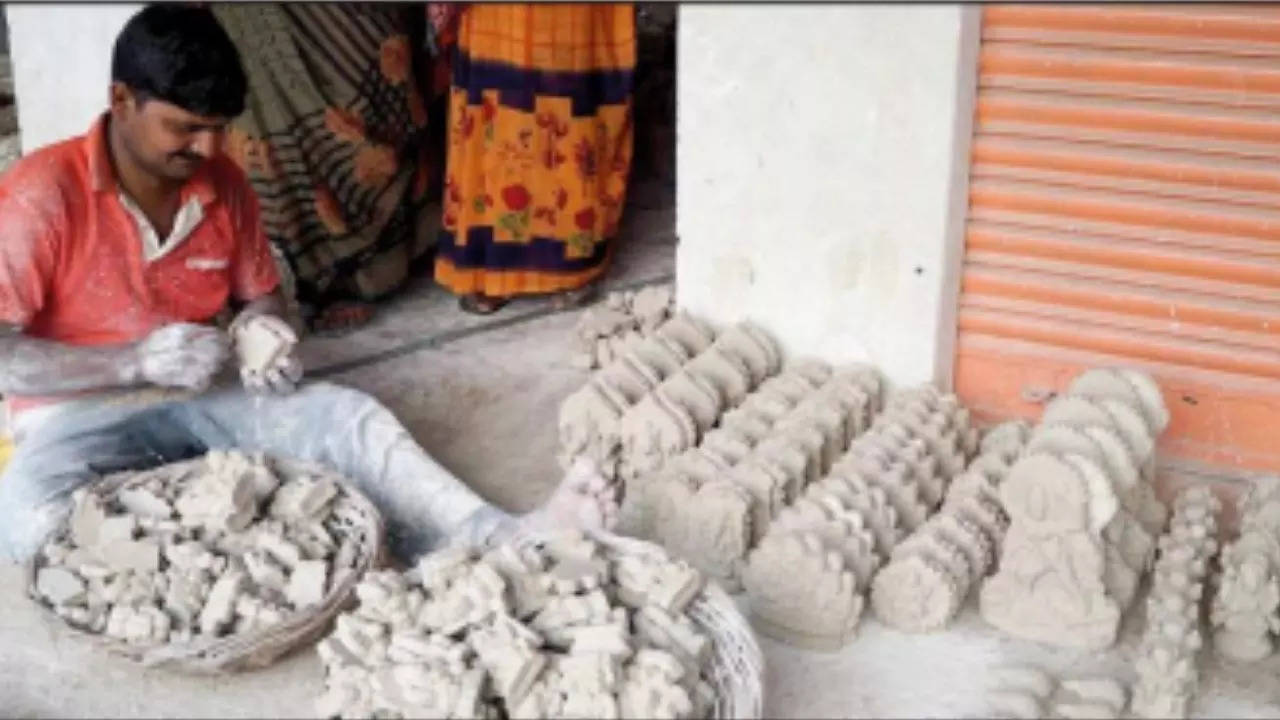Artisans of Chunar red clay pottery switch over to plaster of Paris goods. TOI photo: Sanjay Gupta
