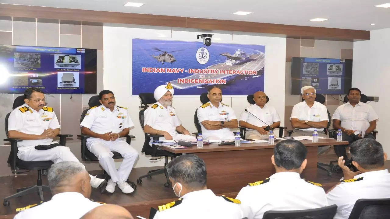 Rear Admiral K Srinivas (middle) speaking at an event in Coimbatore on Monday
