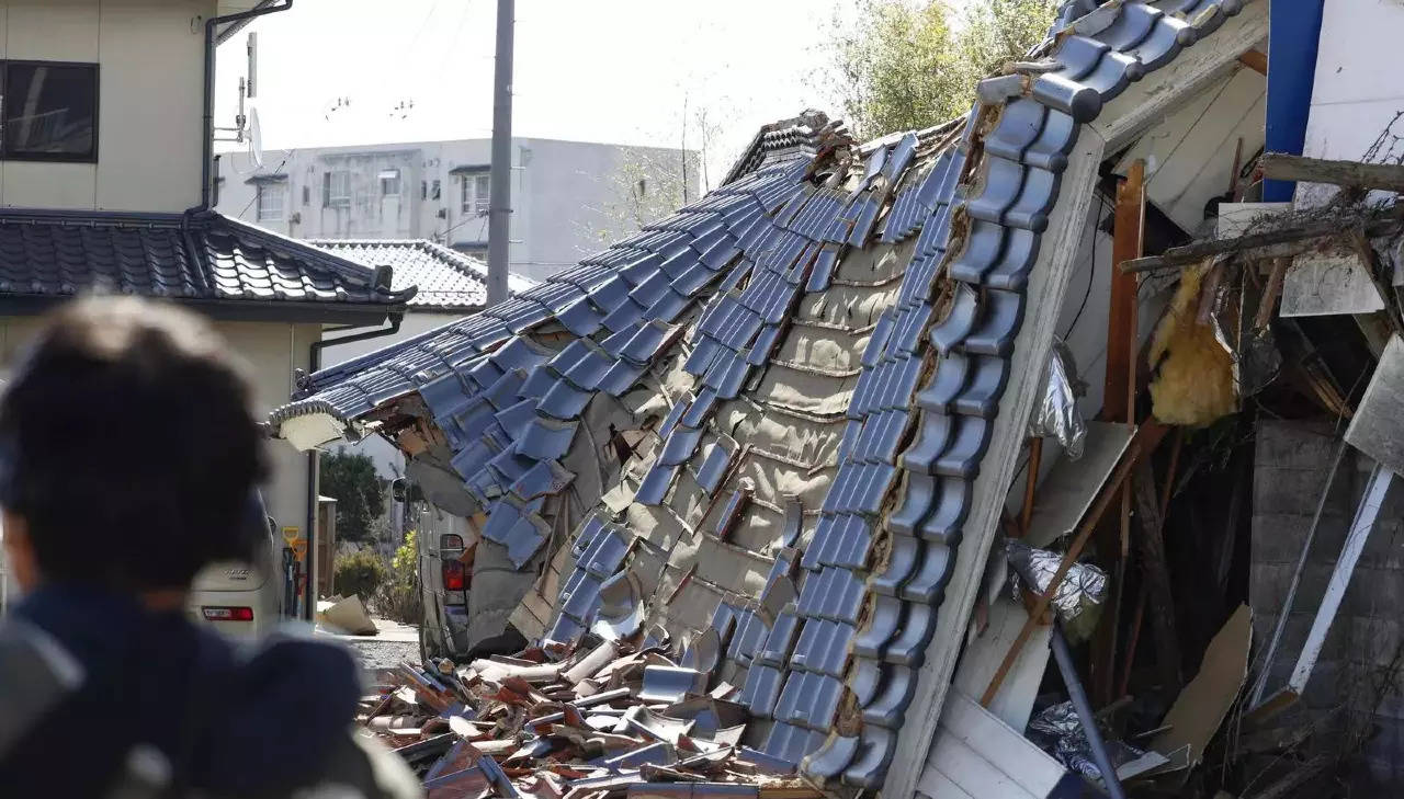 A damaged house is seen following an earthquake in Kunimi, Fukushima prefecture on March 17, 2022.