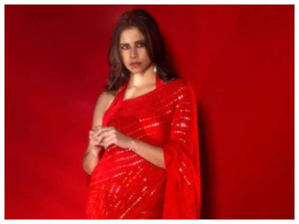 sai: Sai Tamhankar looks ravishing in red saree; See pics | Marathi Movie News - Times of India