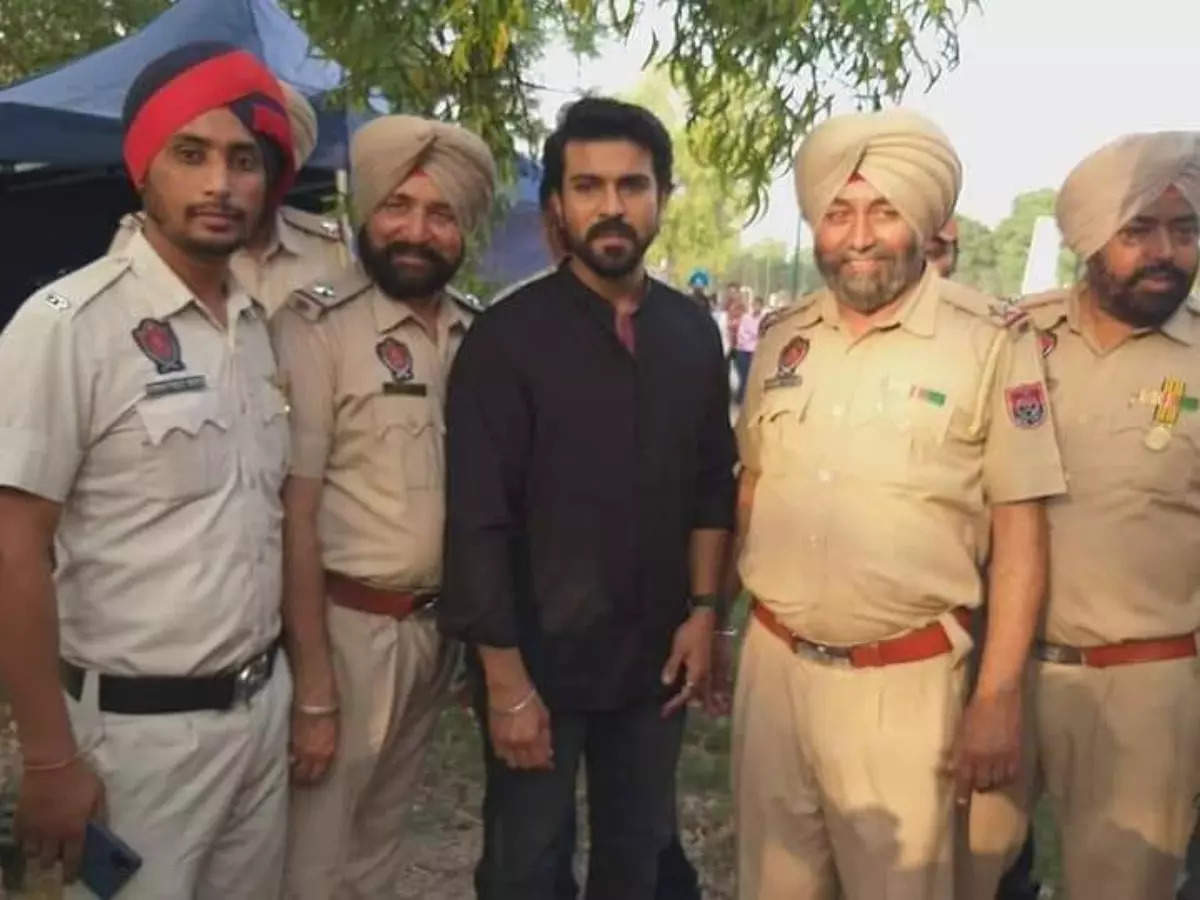 Photos: Ram Charan poses for pics with cops at 'RC 15' shoot in Punjab | Telugu Movie News - Times of India