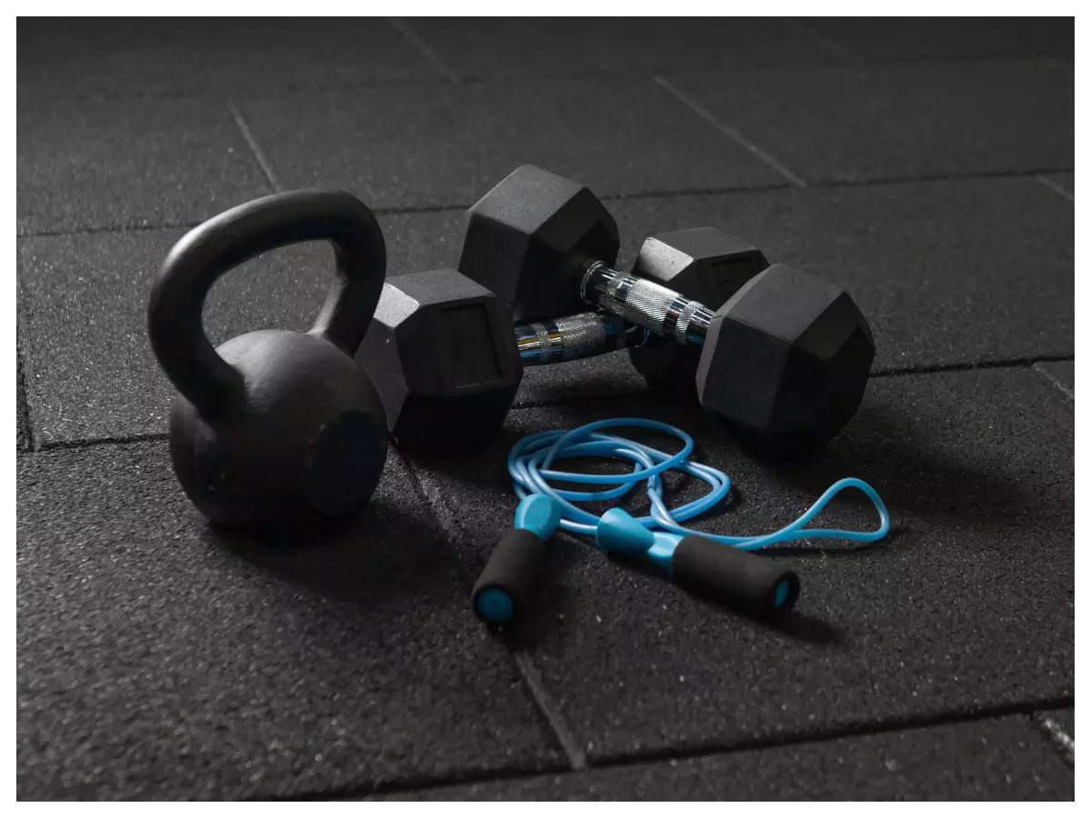 side Blacken Trampe Dumbbell vs Kettlebell: How to choose between dumbbell and kettlebell  during workout - Times of India