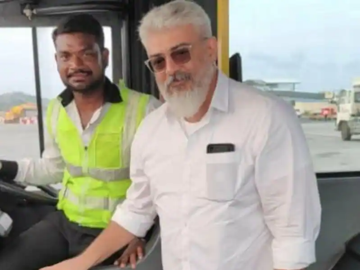 Ajith's latest photo in white shirt with airport staff goes viral ...