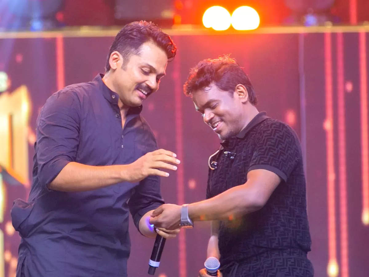 Karthi gifts Yuvan a luxury watch to celebrate his 25th year in ...