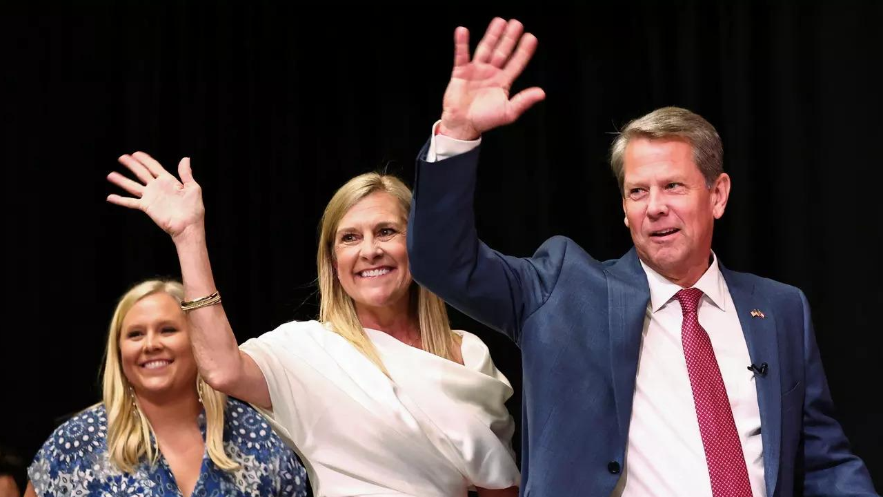 Georgia Governer Brian Kemp walks onstage for a campaign event on Monday (Reuters)