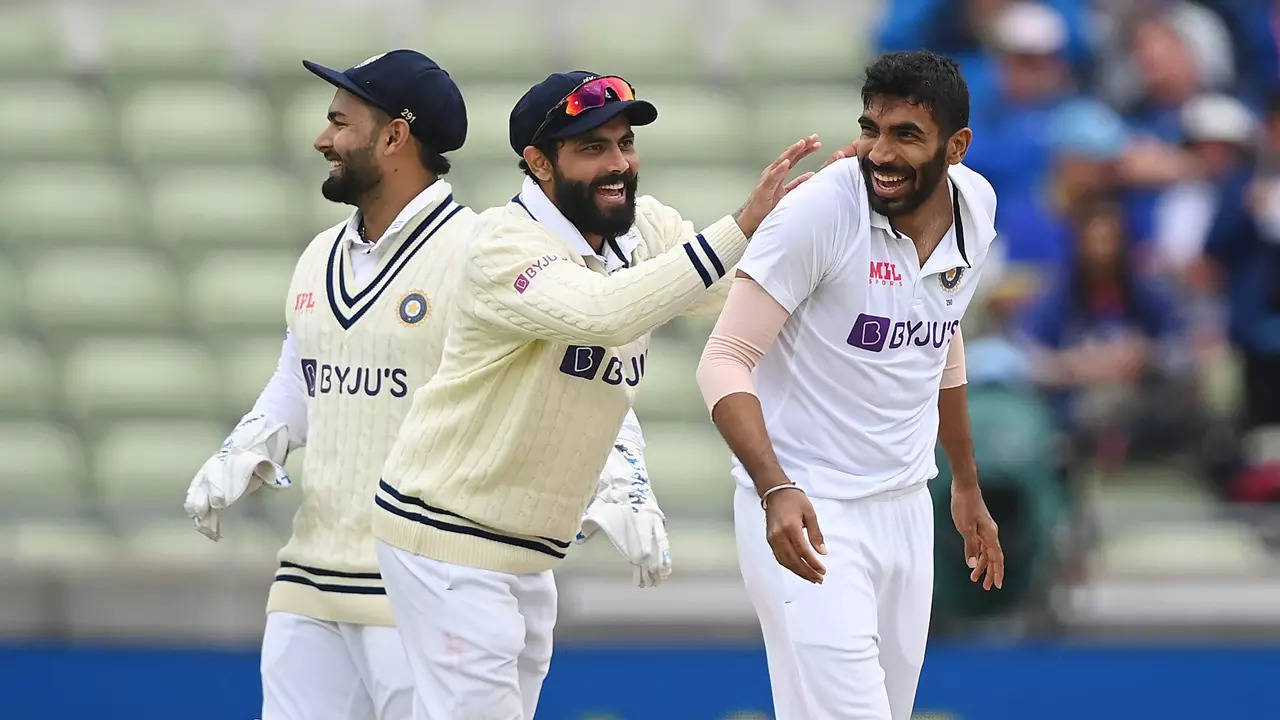 Jasprit Bumrah celebrates with Ravindra Jadeja after taking a wicket. (Getty Images)