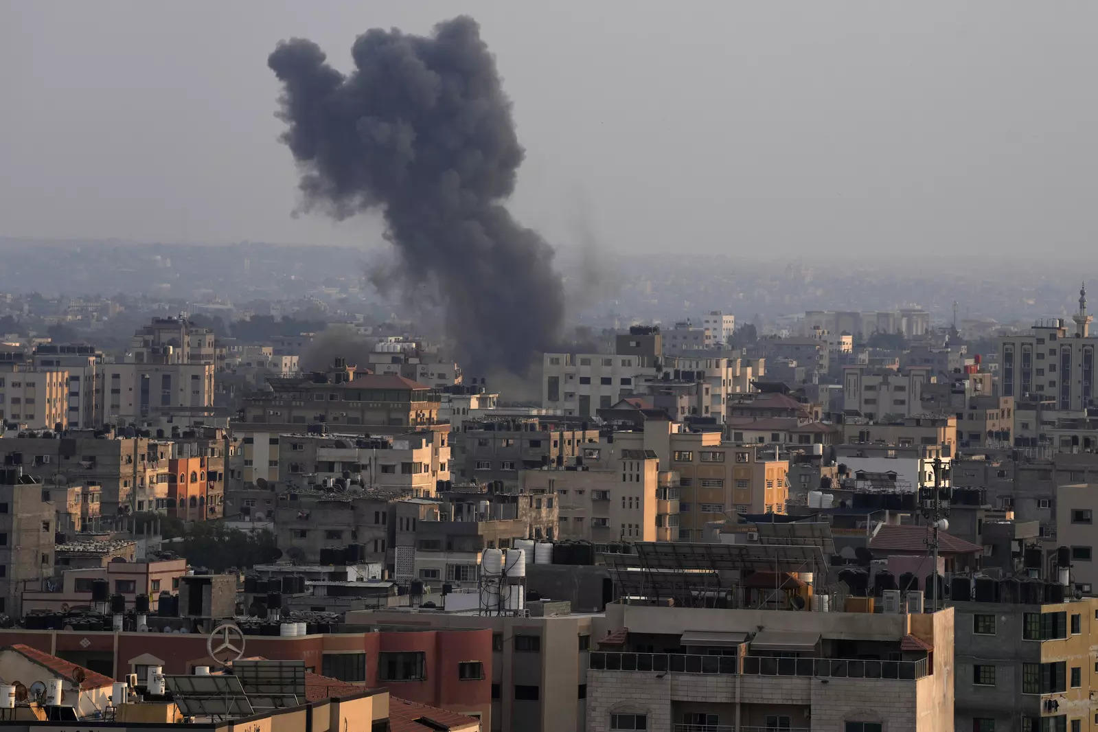 Smoke rises after Israeli airstrikes on residential building in Gaza on Saturday