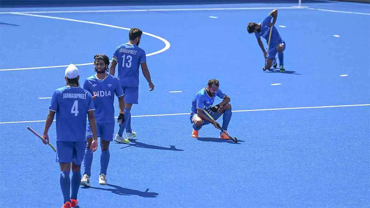 Indian players react after the end of the match against Australia. (PTI Photo)