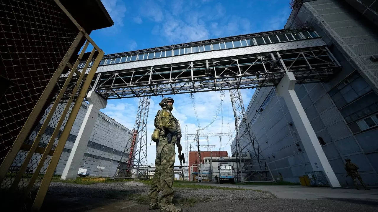 A Russian serviceman guarding an area of the Zaporizhzhia nuclear power station in territory under Russian military control, southeastern Ukraine. (AP photo)