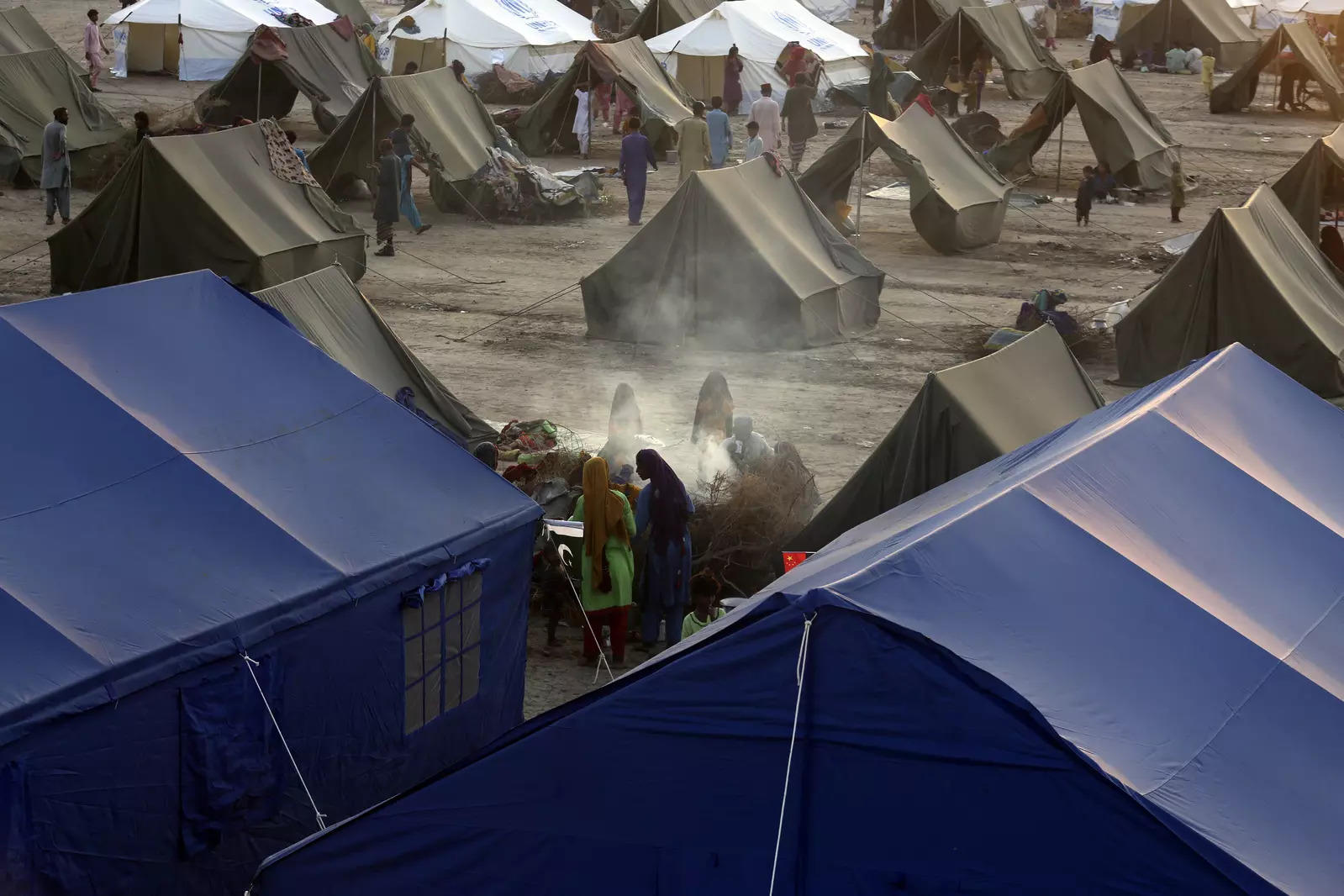 Victims of heavy flooding from monsoon rains take refuge at a temporary tent housing camp organized by the UN Refugee Agency (UNHCR), in Sukkur, Pakistan. (File photo: AP)