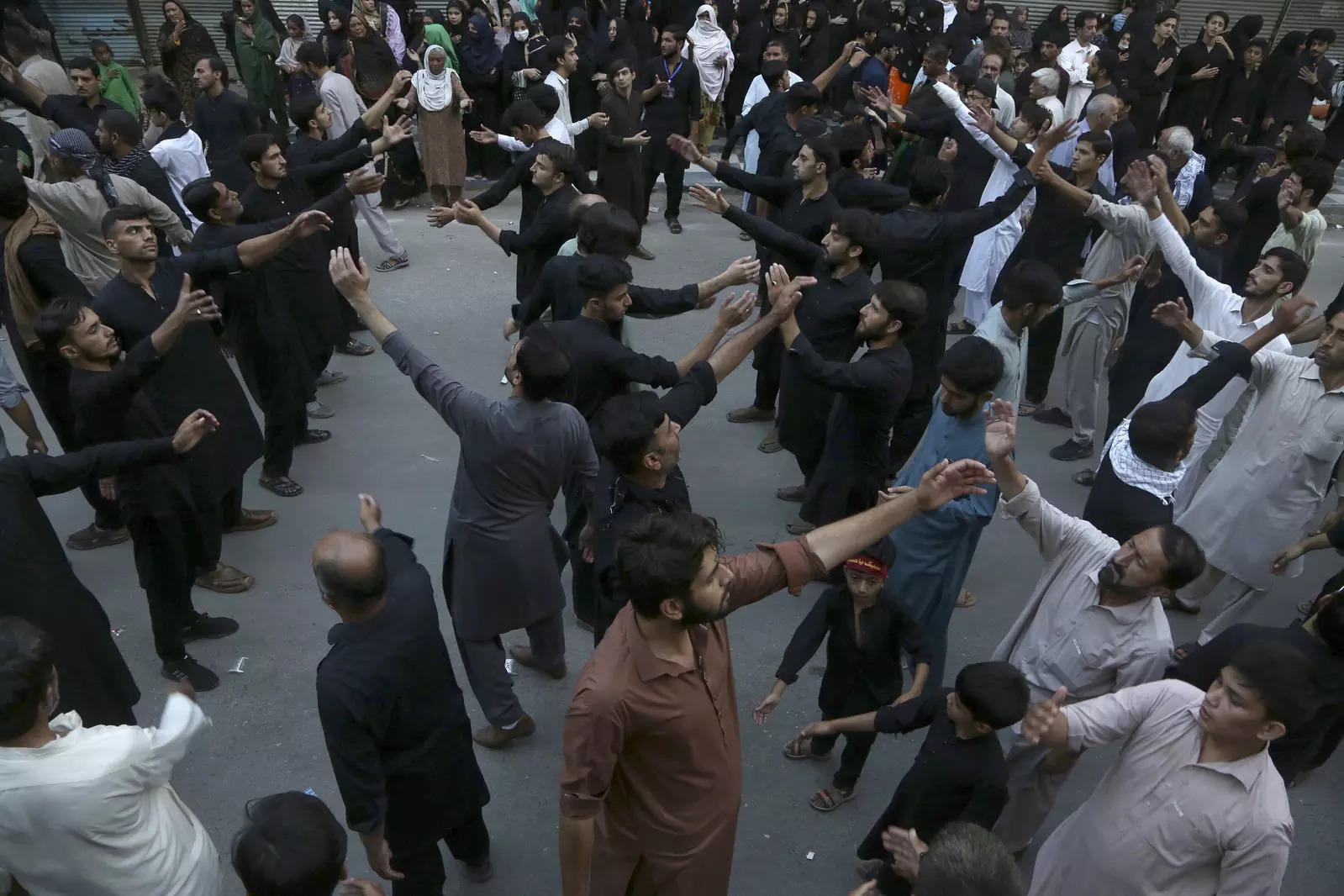 Shiite Muslims take part in a procession marking Chehlum in Peshawar, Pakistan 