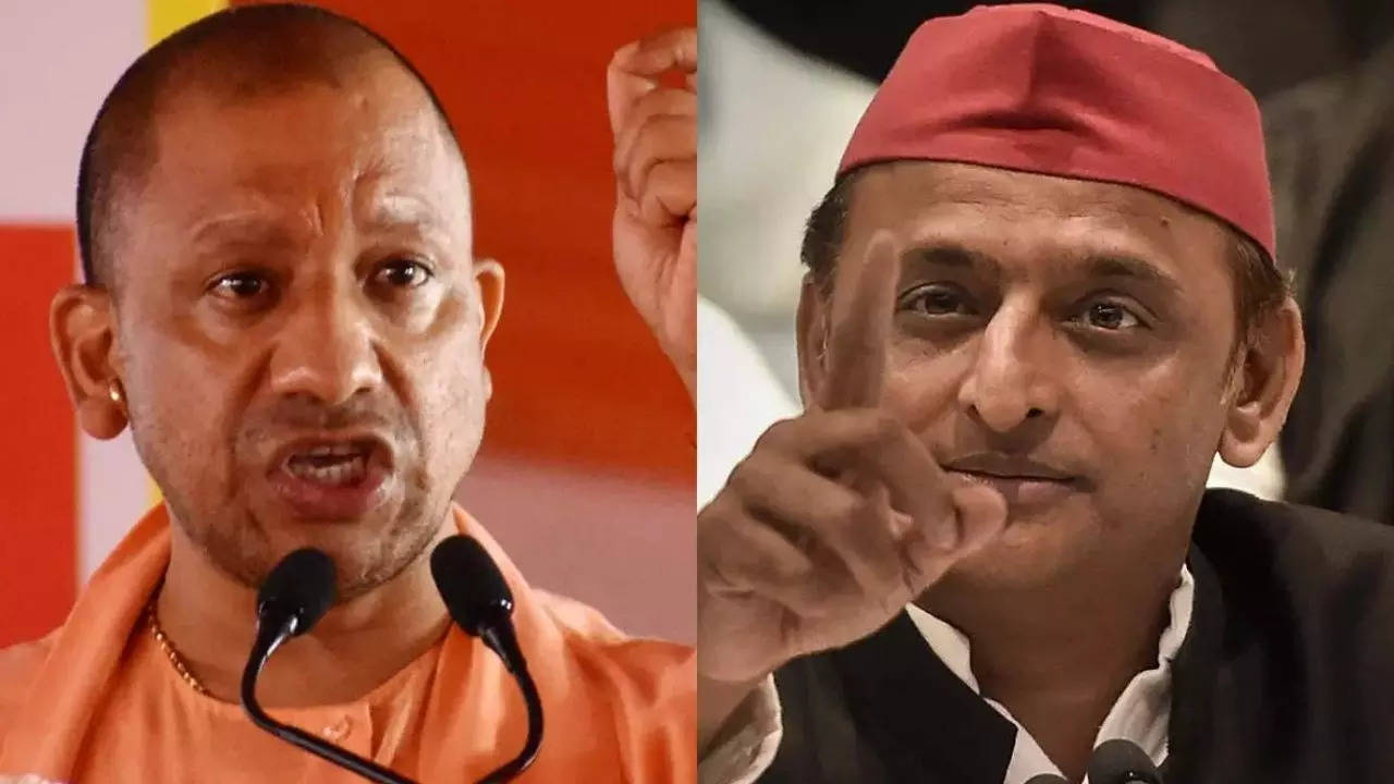 CM Yogi Adityanath, SP chief Akhilesh Yadav trade charges in UP assembly |  India News - Times of India