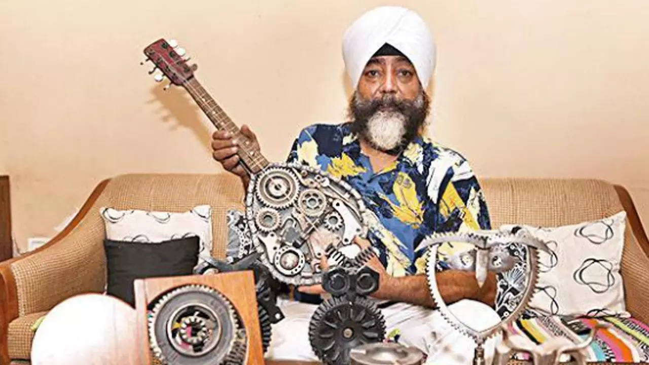 Satpal Gandhi, a Doon-based artist, who has created scores of attractive lamps, windchimes, sculptures and tables using discarded materials (Courtesy: Sukanta Mukherjee)