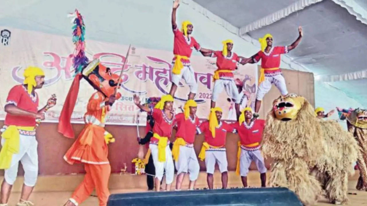 Folk artistes perform at Adi Mahotsav in Udaipur on Tuesday