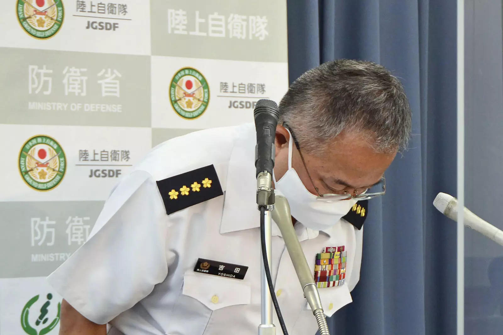 Yoshihide Yoshida, head of Japan’s Ground Self-Defense Force apologize during a news conference in Tokyo 