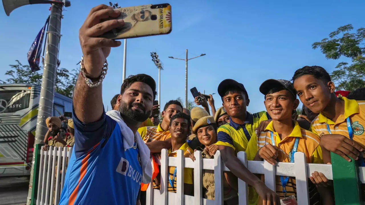 Rishabh Pant takes a selfie with cricket fans in Guwahati. (AP Photo)