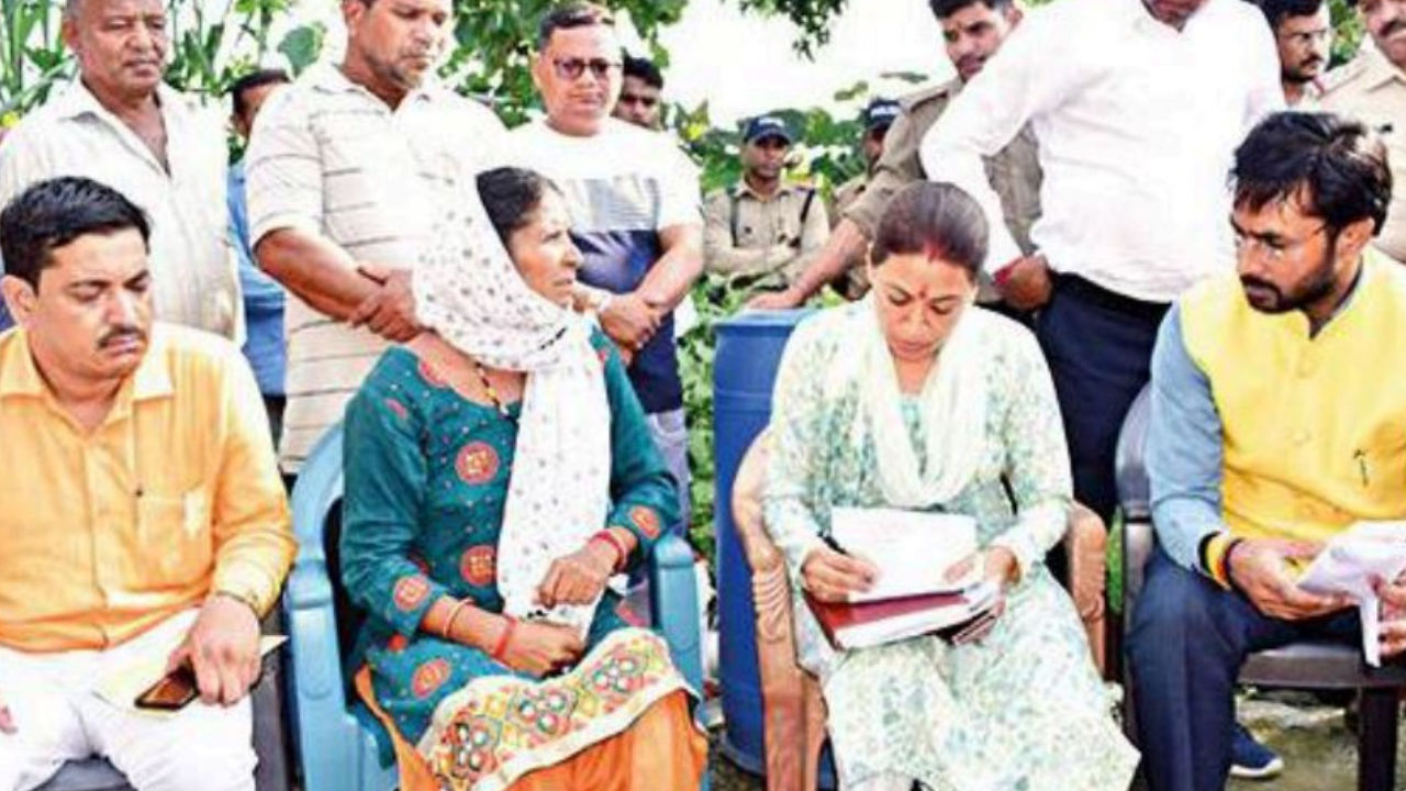 Minister Rekha Arya with Ankita’s family on Sunday