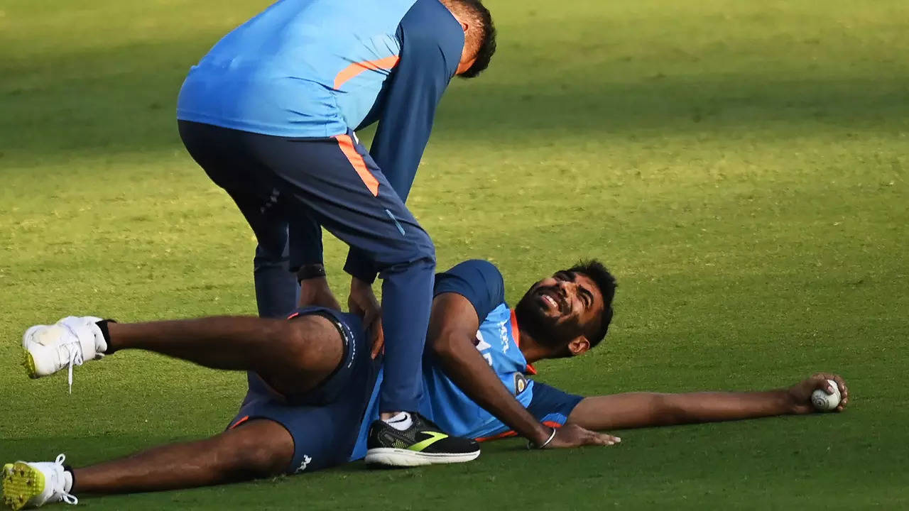 File Pic: Jasprit Bumrah stretches during a practice session on the eve of the first T20 match against South Africa. (AFP Photo)