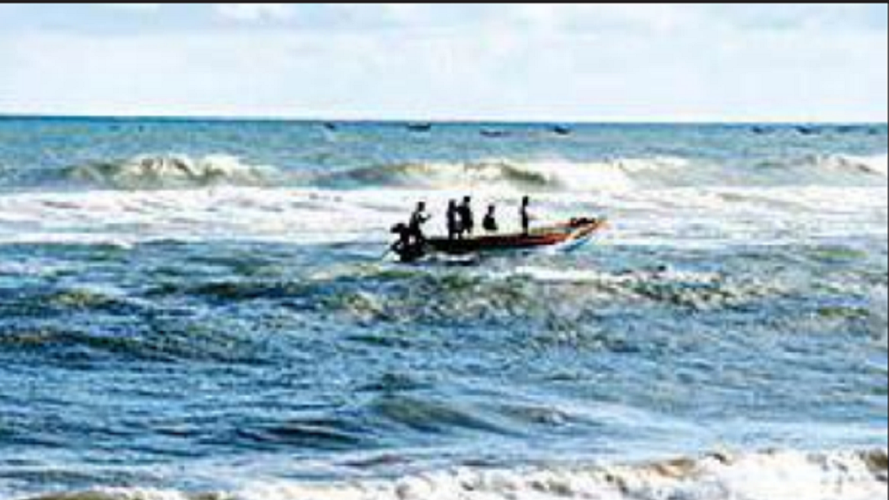 Fishermen return from the sea in Puri on Thursday.