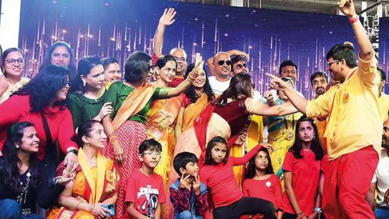 Residents of Purva Palm Beach, young and old, sang and danced in a Kannada Rajyotsava celebration organised on Saturday