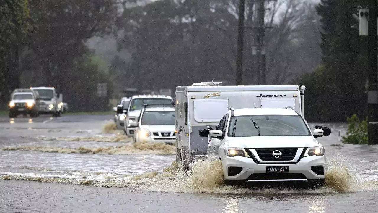 Heavy rain triggered flash floods that cut off some inland towns in Australia's southeast on Monday