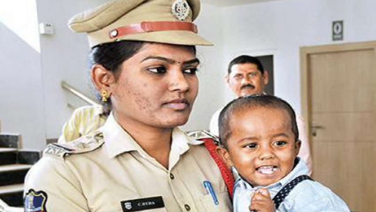 Rescued boy with a police official
