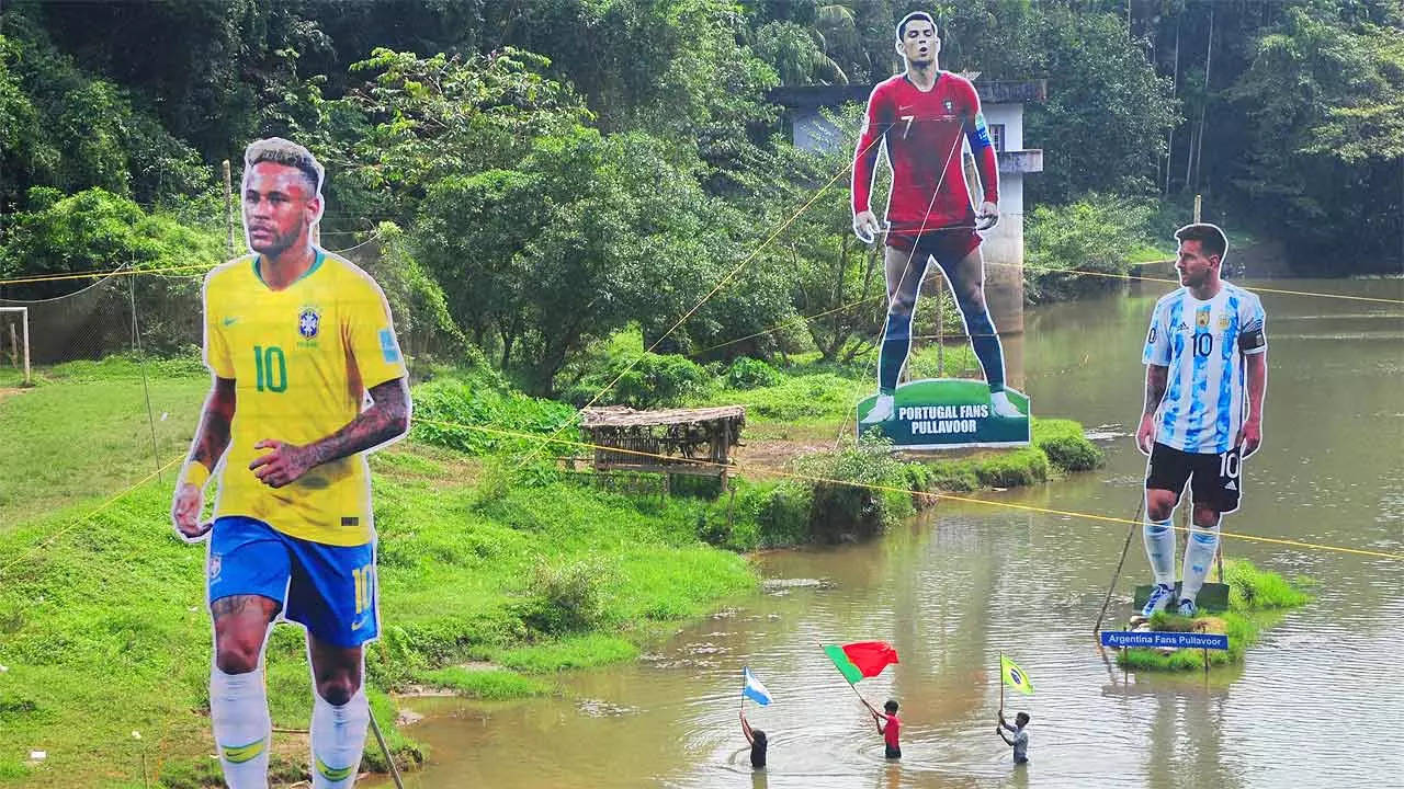 Giant cutouts of Neymar (L), Cristiano Ronaldo (C) and Lionel Messi in river Cherupuzha at Kozhikode in Kerala. (AFP Photo)