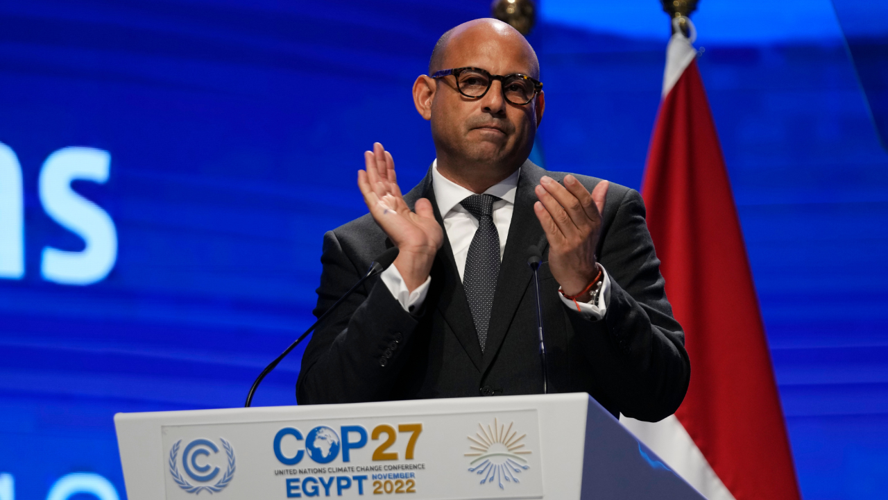 Simon Stiell, U.N. climate chief, claps as he speaks during a closing plenary session at the COP27 U.N. Climate Summit (AP)